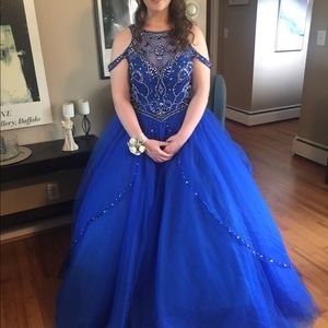 Exquisite formal princess ball gown in Royal blue for prom or quinceañera.
